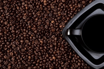 Wall Mural - Coffee cup on coffee beans