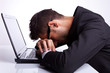 © Viorel Sima - Tired business man sleeping on laptop