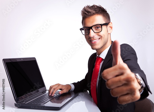 Fototapeta do kuchni business man working and showing ok