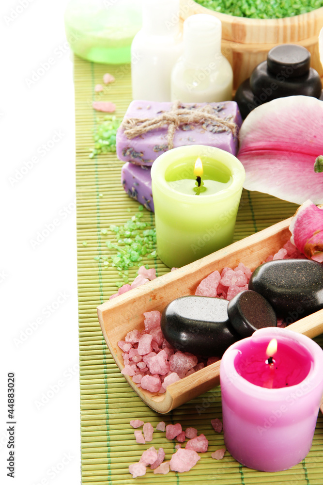 beautiful spa setting with lily isolated on white