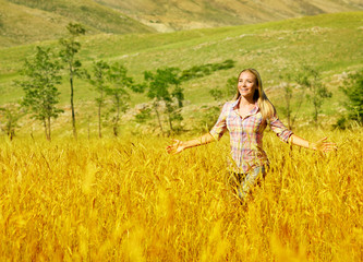 Canvas Print - Woman on wheat field