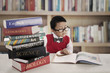 © Creativa Images - Student with lessons books