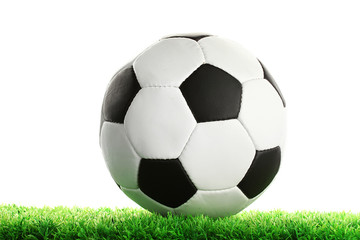 Wall Mural - football ball on green grass, isolated on white