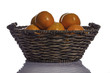 Woven basket full of juicy oranges