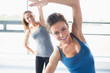 © WavebreakmediaMicro - Women stretching their arms
