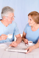 Wall Mural - old couple at breakfast