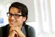 © goodluz - Portrait of handsome young man with glasses