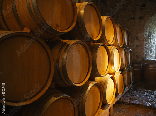 Cuadros en Lienzo Wine barrels in a old wine cellar