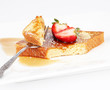 French toast with syrup and strawberry