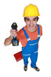 © auremar - Young carpenter stood with cordless drill