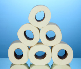 Wall Mural - rolls of toilet paper on blue background