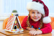 © Ramona Heim - girl with gingerbread house