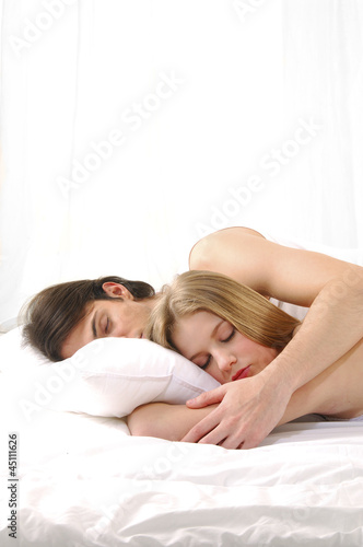 Lovely Couple In Bed Lying In Bedroom Buy This Stock Photo