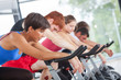 © william87 - Group of People Cycling at Gym