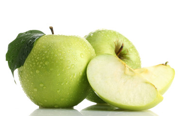 Ripe green apples with leaf and slice, isolated on white