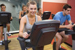 © WavebreakmediaMicro - Smiling woman in spin class