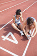 © WavebreakmediaMicro - Woman caring about runner with sports injury