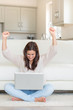 © WavebreakmediaMicro - Woman celebrating in front of laptop