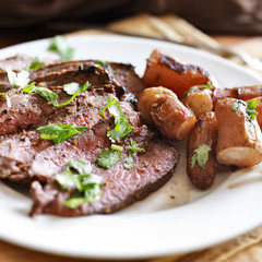 Wall Mural - London broil beef roast with french fingerling potatoes