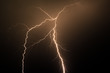 Spetacular orange lightning strike in the night