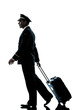 man in airline pilot uniform silhouette walking