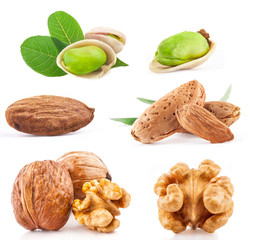 Wall Mural - Walnut, Almond and Pistachio nuts isolated on white background