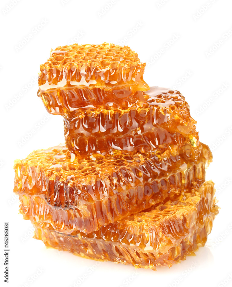 sweet honeycombs with honey, isolated on white
