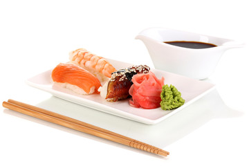 Wall Mural - delicious sushi served on plate isolated on white