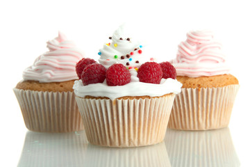 Wall Mural - tasty cupcakes with berries, isolated on white