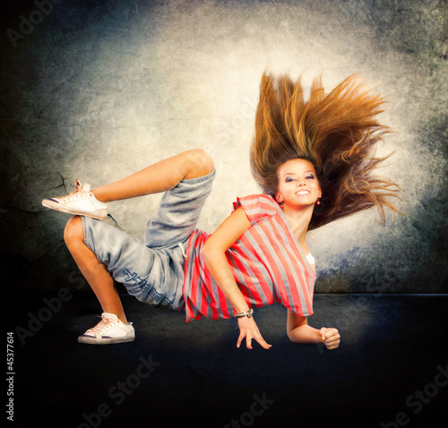 Fototapeta na wymiar Dance. Hip-Hop Dancer. Dancing Teenage Girl