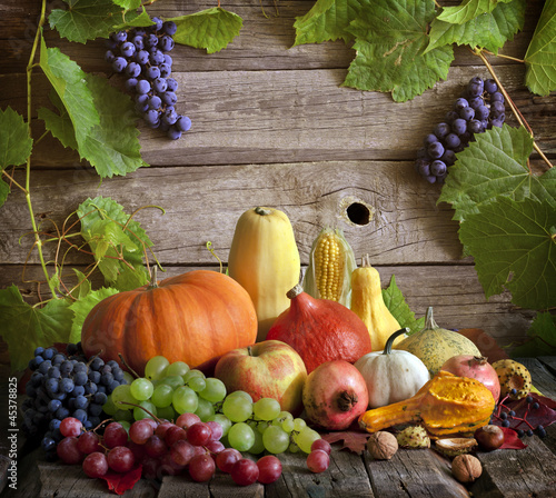 Naklejka na szybę Fruits and vegetables with pumpkins in autumn still life