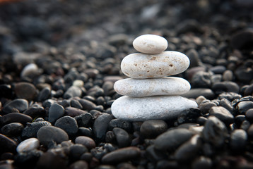 zen garden with stone stack