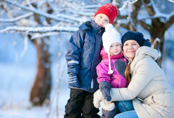 Wall Mural - Family outdoors on a winter day