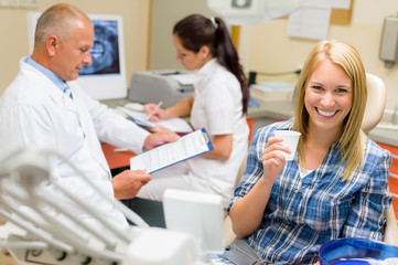 Wall Mural - Beautiful smile patient at the dentist