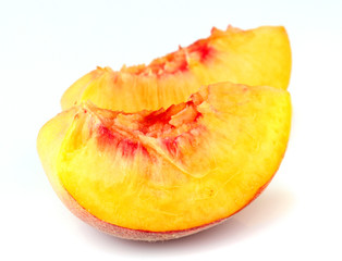 Poster - Slices of peach on white background