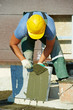 © Kadmy - tiler at granite stairs way construction works