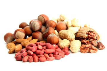 Wall Mural - assortment of tasty nuts, isolated on white