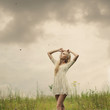 © VectorART - Beautiful girl posing in a field