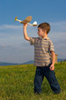 Boy playing with model airplane © Krzysztof Nogawczyk