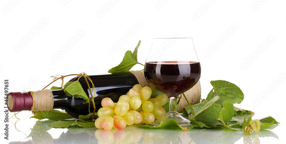 bottle of wine with grape leaves isolated on white