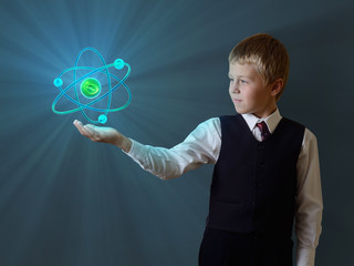 Sticker - schoolboy holding glowing atom