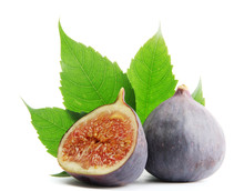 Ripe Sweet Figs With Leaves Isolated On White
