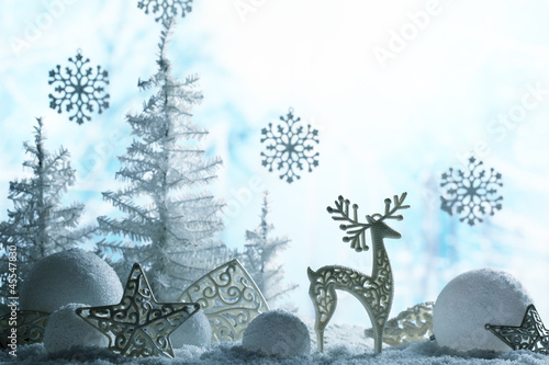Fototapeta na wymiar Christmas ornaments on snowflakes.