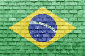 Wall Mural - Brazil flag on a brick wall