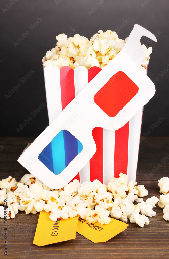popcorn with glasses and tickets