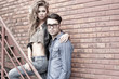 © matusciac - Sexy and fashionable couple wearing jeans, grungy location