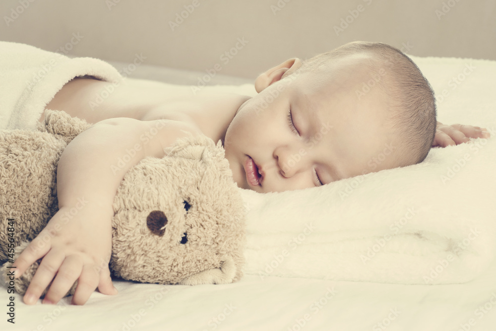 Śpiący noworodek - obrazy, fototapety, plakaty 