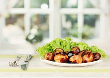 Roasted Chestnuts With Lettuce In The Plate