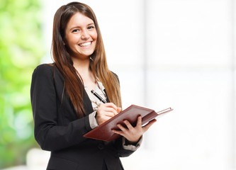 Canvas Print - Woman writing notes