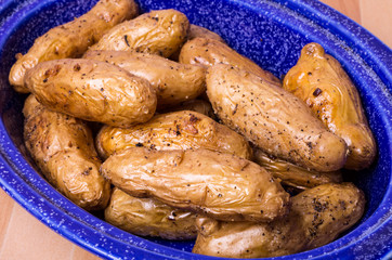 Wall Mural - Dish of fingerling potatoes baked in oven